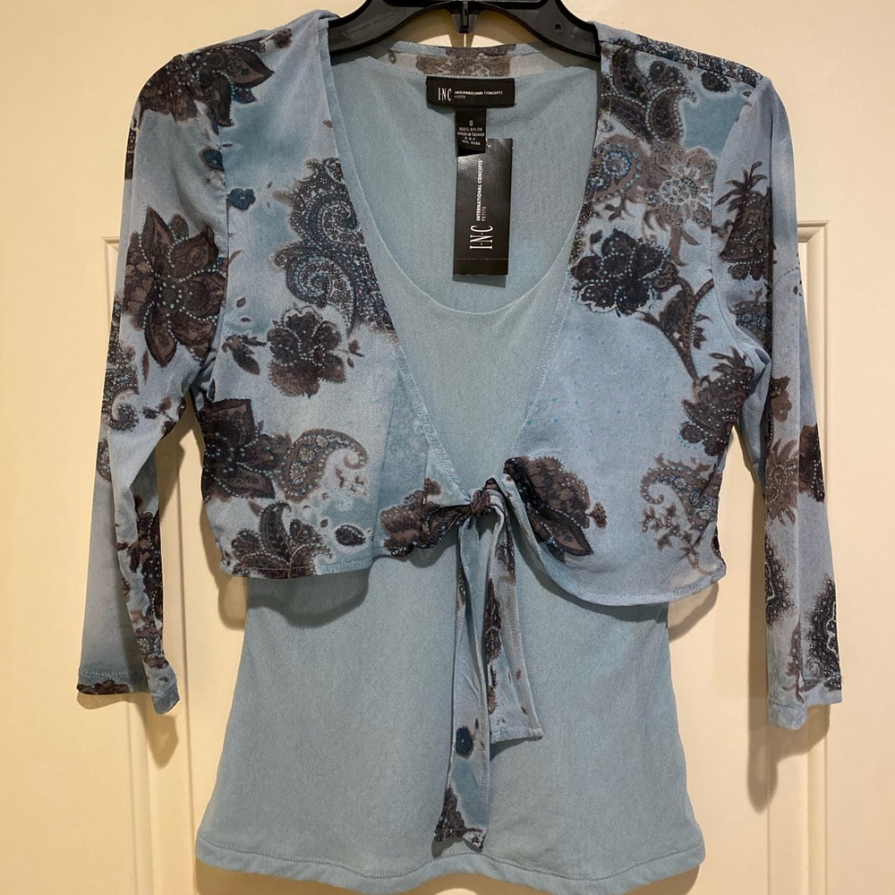 NWT INC Top